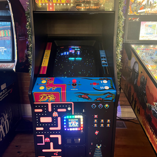Arcade game cabinet 15 on the floor at 1UP Arcade Bar