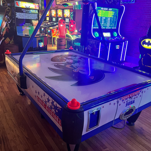 Arcade game cabinet 8 on the floor at 1UP Arcade Bar