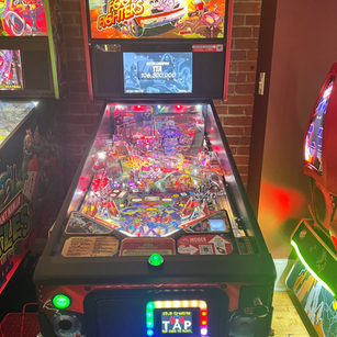 Arcade game cabinet 19 on the floor at 1UP Arcade Bar