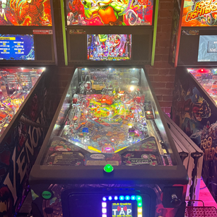 Arcade game cabinet 18 on the floor at 1UP Arcade Bar
