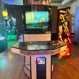 Arcade game cabinet 21 on the floor at 1UP Arcade Bar