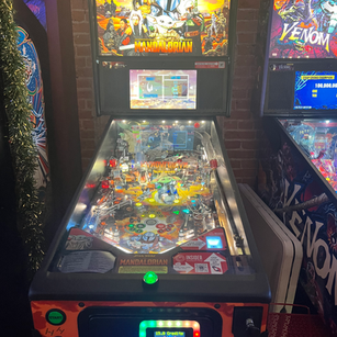 Arcade game cabinet 17 on the floor at 1UP Arcade Bar