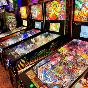 Arcade game cabinet 10 on the floor at 1UP Arcade Bar